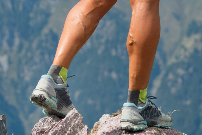 Detail,Of,Legs,Athlete,Woman,Running,In,The,Mountains,With