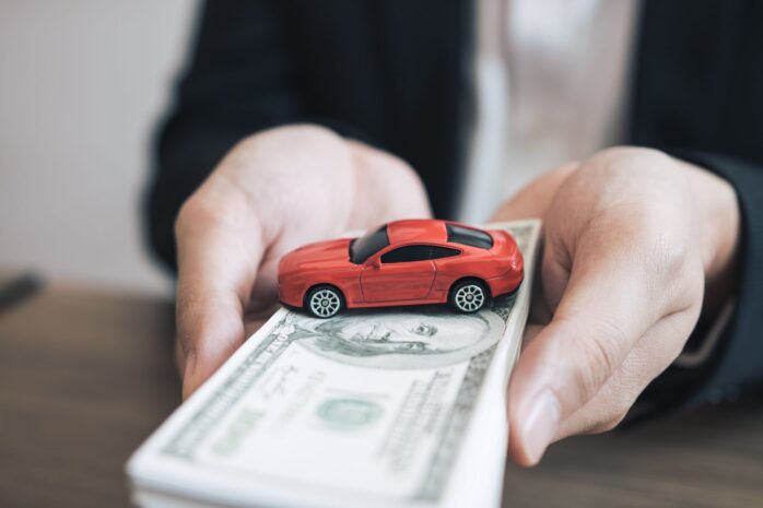 midsection-of-car-insurance-agent-holding-paper-royalty-free-image-