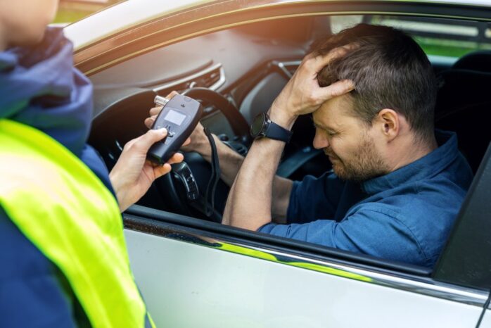 Drink,And,Drive,Concept,-,Sad,Drunk,Man,Sitting,In