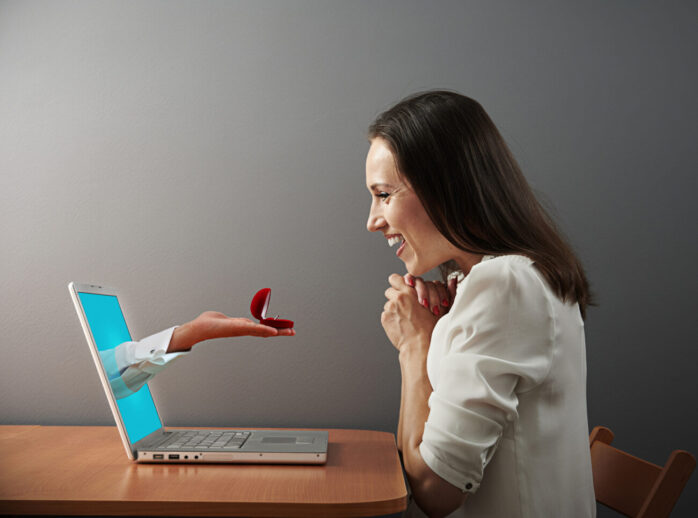 woman looking at ring