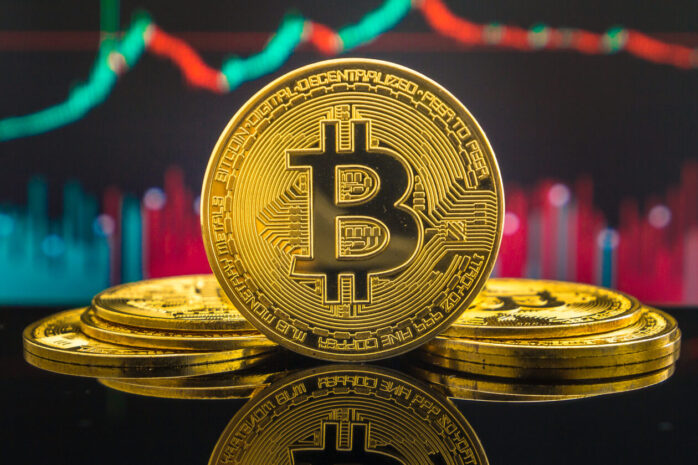 Bitcoin cryptocurrency gold coin. Trading on the cryptocurrency exchange. Trends in bitcoin exchange rates. Rise and fall charts of bitcoin.