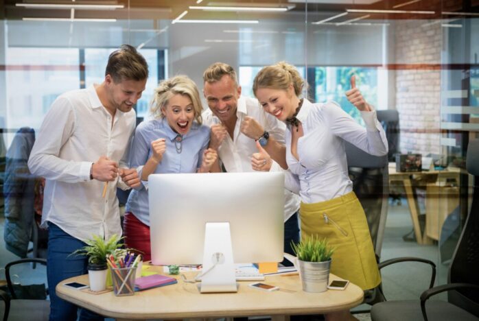 happy-business-team-celebrate-success-at-work